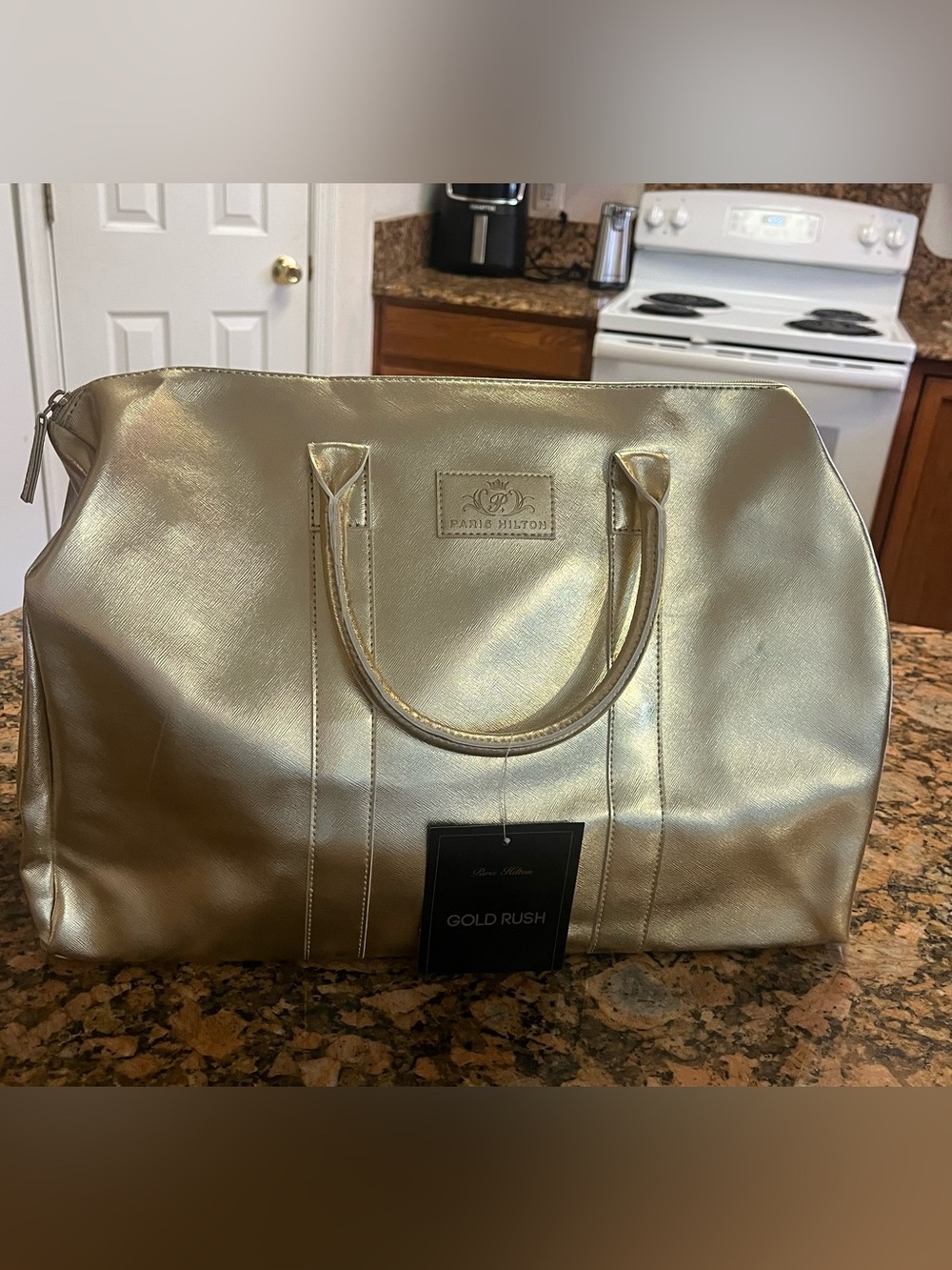 Paris Hilton’s gold rush,large shoulder purse/bag sac.